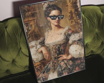 May include: Framed vintage portrait of a woman in a floral dress with the text "DEAL WITH IT" covering her eyes. The artwork is displayed on a green velvet couch. The portrait has a black frame.