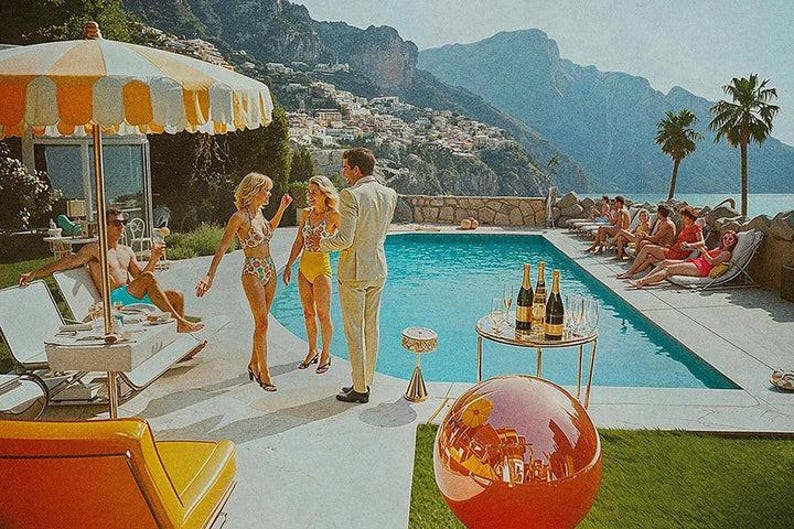 May include: Vintage-style image of a poolside gathering. People in swimwear and suits are socializing near a pool with champagne bottles on a side table. The scene is set against a backdrop of mountains and a coastal town.