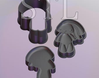 May include: Three black plastic cookie cutters shaped like a bunny rabbit, a bunny head, and a circle. The bunny rabbit cutter has long ears and a small tail.