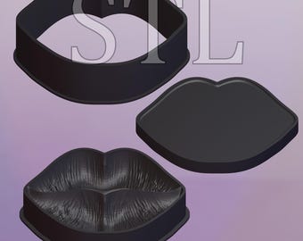 May include: Three black plastic lips, one with a detailed texture, are arranged in a group. The lips are shaped like a box with a lid.