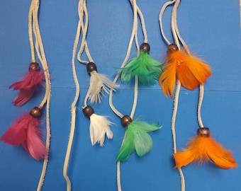 Vintage deadstock feather and suede with wood beads hair clips 1970s 4 amazing colors, all similar but no 2 alike.