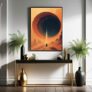 May include: A digital art print depicting a solitary figure standing on a desert landscape, gazing upwards at a large, dark, circular object in the sky. The object is encircled by a vibrant orange glow.