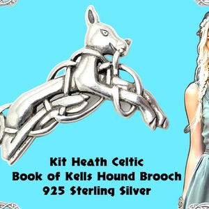 May include: A silver brooch shaped like a leaping hound intertwined with Celtic knotwork. The text reads: Kit Heath Celtic Book of Kells Hound Brooch 925 Sterling Silver. The design features a polished metallic finish with intricate, flowing lines.