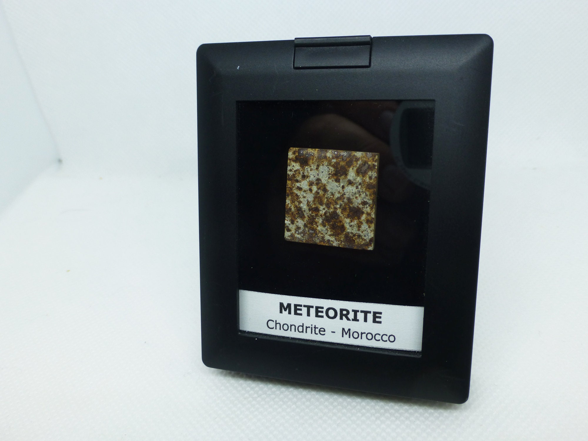 North West Africa (NWA)  Unclassified Stone Meteorite with display case.
