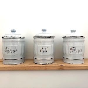 Antique French white enamel tin, lidded jar with faded lettering, farmhouse kitchen decor in enamel-sugar-chicory-coffee