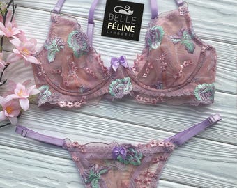 Romantic sheer lace lingerie set: soft pastel florals in lavender and green, creating a playful, feminine look perfect for special occasions