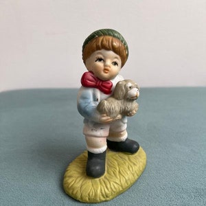 Vintage Ceramic Boy Statuette Collectible Home Decor Unique Figurine Art