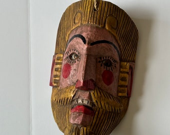 Carved Wood Mask with Glass Eyes