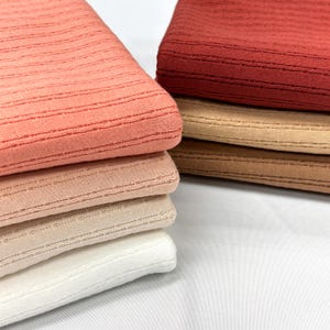 ANNIE RIB  Knit is a super soft and cozy fabric. Stretch Knit Ribbed. 60&quot; Wide. wholesale fabric.