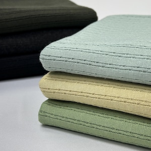 ANNIE RIB Brushed Rib Knit is a super soft and cozy fabric. Stretch Knit Ribbed. 60"  width. wholesale fabric.