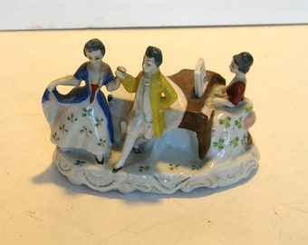 Romantic Colonial Dancing Couple with Woman at Piano Figurine