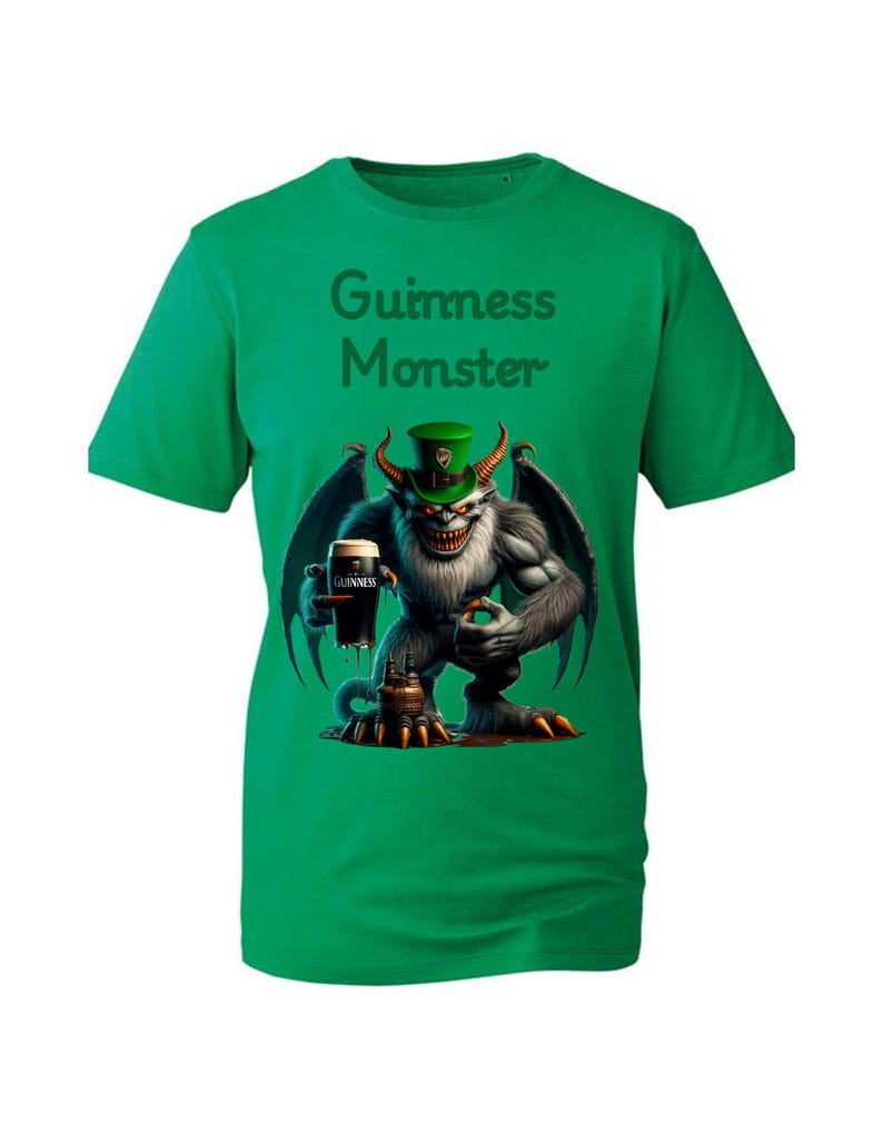 May include: Green t-shirt with a white monster holding a glass of Guinness beer. The monster is wearing a green hat with a shamrock on it. The text "Guinness Monster" is printed on the shirt.
