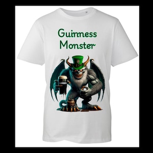 May include: White t-shirt with a green, black, and white monster holding a pint of Guinness. The text "Guinness Monster" is printed on the shirt.