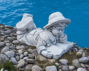 Laying kid statue, Boy with book figurine, Concrete reading book sculpture, Massive kid figure, Outdoor or indoor decoration