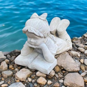 Massive girl with book statue, Reading child concrete sculpture, Laying kid garden memorial, Stone girl yard decoration, Backyard figurine