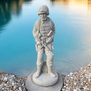 Detailed soldier on base figure, Standing soldier statuary, Modern soldier, Massive army man memorial, Fallen soldier memorial sculpture
