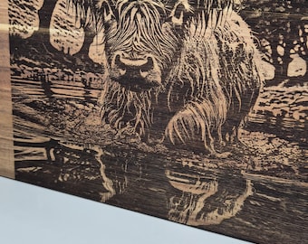 Highland Cow designer cutting board.