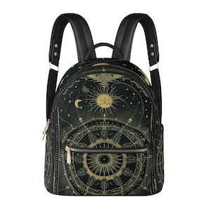 May include: A black backpack with adjustable straps and a gold and green celestial print. The print features a sun, moon, stars, and a compass design.