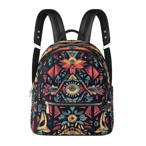 May include: A black backpack with a colorful geometric pattern in red, yellow, and teal. The backpack has black straps and a front zippered pocket with a gold zipper. The design features eye and triangle shapes.