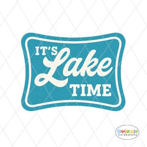 May include: A rectangular teal graphic with rounded corners and a white border. The text IT'S LAKE TIME is written in a combination of white sans-serif and script fonts. The teal background features a subtle, light-colored speckled texture.