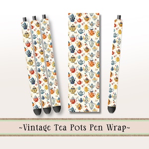May include: A pen wrap set and pens featuring a vintage teapot pattern in various colors. The pattern includes teapots in blue, orange, yellow, and red, with small floral accents on a cream background. The text "Vintage Tea Pots Pen Wrap" is at the bottom.