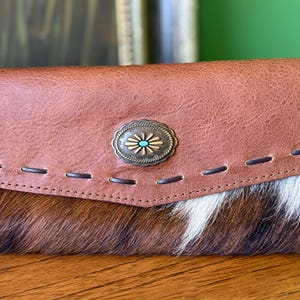 cartera, cuero original, hecho a mano,  cómoda, espaciosa