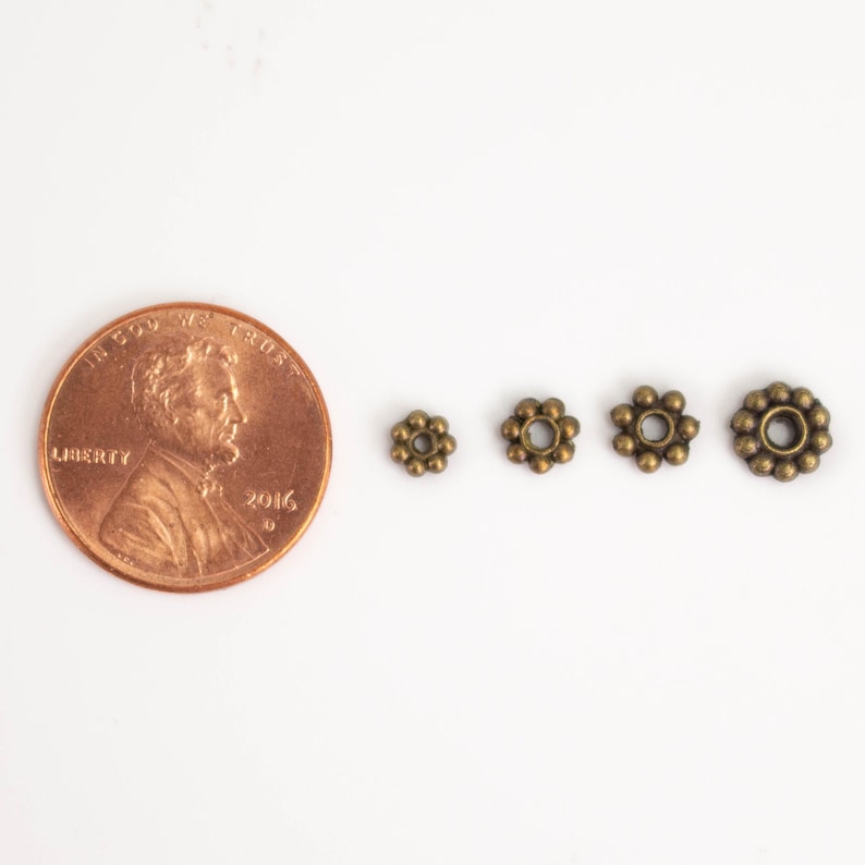 Cuentas espaciadoras de margaritas con acabado en cobre antiguo - 4 mm (300 unidades) - Lote al por mayor imagen 4