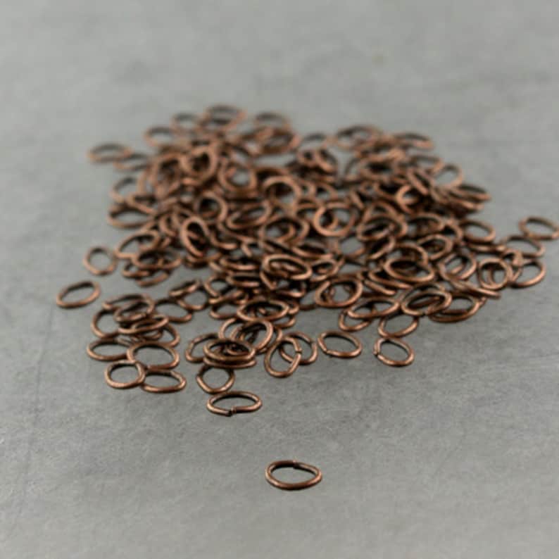 200 pcs of Antique Copper tiny little oval Jumprings Jump Rings 4x3mm Oval Jump Rings 4x3mm 24 guage 0.5mm Link Connector Open Jump Rings