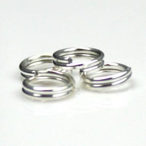 1 ounce (about 470 pcs) of Silver finished split rings - 5mmST