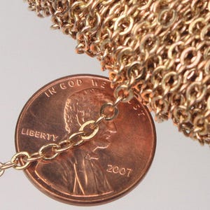 Cadena de cable plano de cobre en bruto: 3,4 x 2,9 mm, eslabones soldados, 9,75 metros (32 pies) - Carrete a granel - 3429F