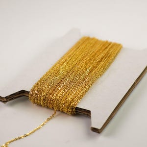 Cadena micro plana chapada en oro - (eslabón soldado de 1,5 x 1,2 mm) 3 metros - 1512F