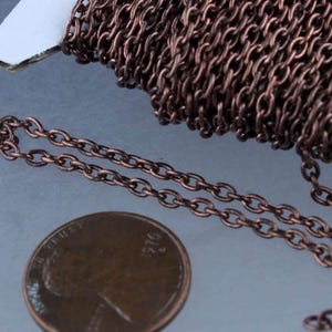 Łańcuch kablowy owalny, wykończenie antyczna miedzianym wykończeniem - 3x2,2 mm - ogniwo nielutowane - 322CA 12 stóp