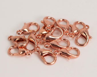 Zapięcia typu homar platerowane błyszczącą miedzią, odporne na matowienie: elementy biżuterii (12 x 7 mm)