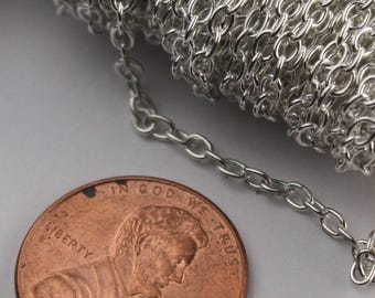 Chaîne câble à maillons soudés ronds plaqué argent - Maillons soudés de 2,6 x 2,1 mm - 2621V 100 pieds - Bobine en vrac