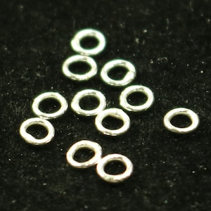 25 srebrnych zamkniętych kółek zaciskowych - 3 mm, grubość 22G, 0,6 mm - zamknięte kółka zaciskowe ze srebra próby 925