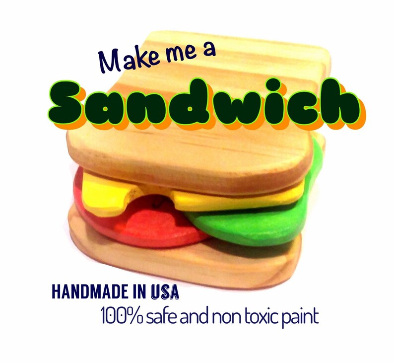 May include: A wooden toy sandwich with yellow, red, and green pieces. The sandwich is made of wood and has a natural finish. The text "Make me a Sandwich" is printed on the top of the sandwich. The text "HANDMADE IN USA 100% safe and non toxic paint" is printed below the sandwich.