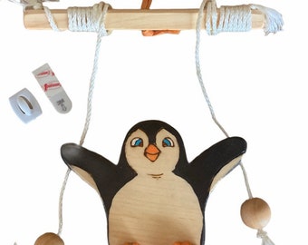 Wall climbing penguin