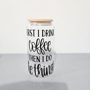 Glass cup with bamboo lid and glass straw