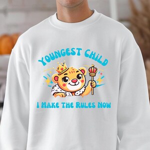 Funny Youngest Sibling Sweatshirt Relatable Sweater For Family Youngest Sibling Gift Youngest Kid Sibling Humor Shirt For Family Unisex