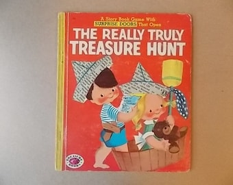 May include: A vintage children's book titled The Really Truly Treasure Hunt with a red cover featuring a boy in a newspaper hat and a girl in a wooden tub holding a yellow flag and a brown teddy bear, with the text Surprise Doors That Open.