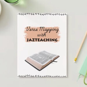 May include: A white sheet of paper with a peach-colored rectangle and black text that reads "Verse Mapping with JAZTEACHING". A brown open Bible is on the paper.