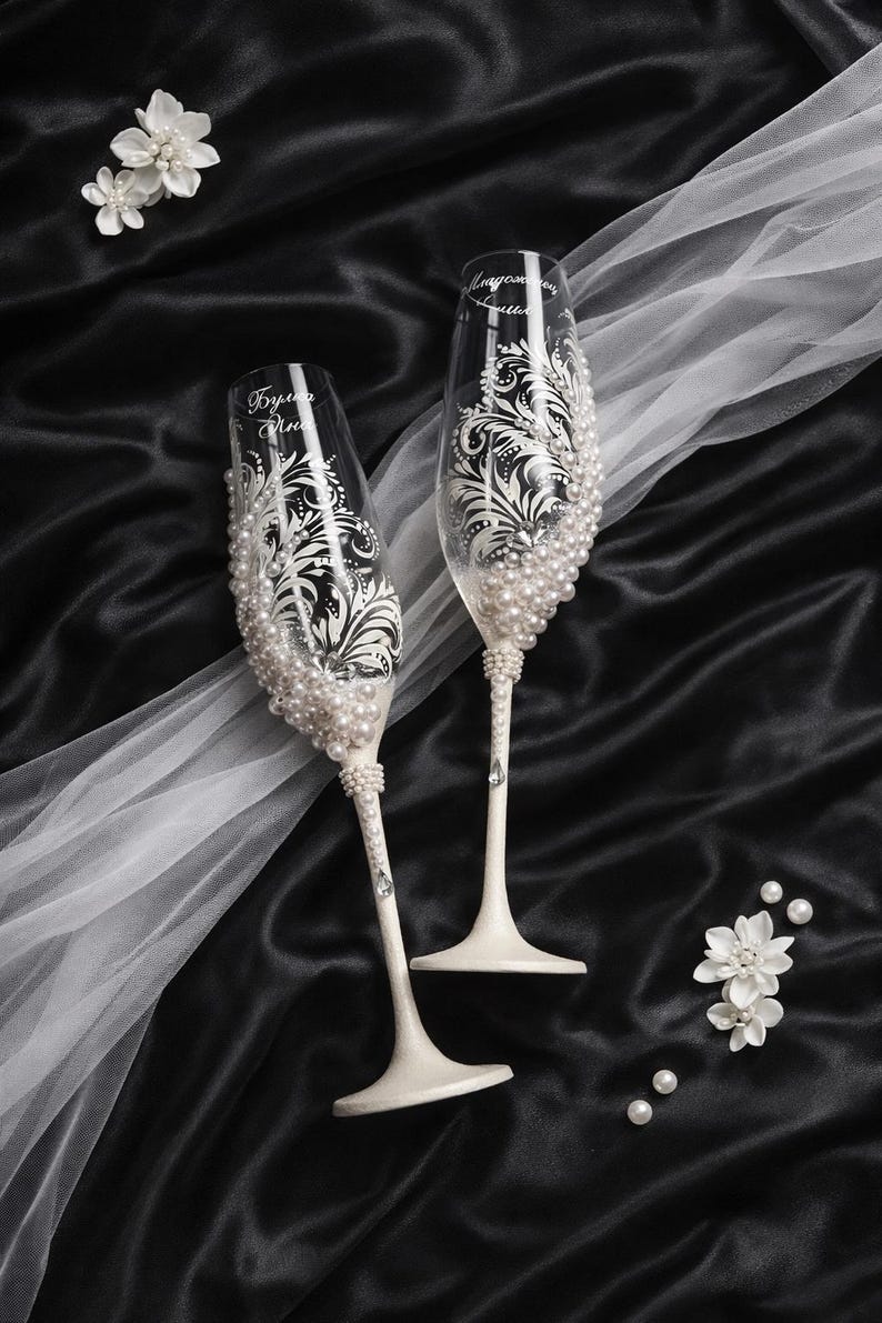 engraved wedding champagne glasses, pearl wedding flutes, mr and mrs glasses, hand painted champagne flutes, wedding cake knife server set, pearl handle cake server, bridal toast set, wedding glassware set, floral engraved glasses, bride groom toast flutes, wedding gift set, ivory pearl wedding decor, cake cutting set wedding, custom wedding glasses, elegant pearl flutes