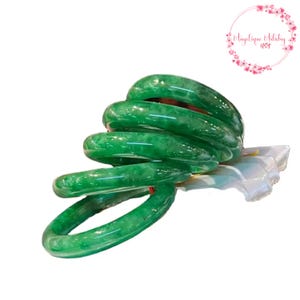 Dark Green Jadeite Bangle - A Symbol of Prosperity and Elegance