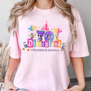 Disneyland 70th Anniversary Shirt, Celebrate Happy Castle Graphic Shirt, Disneyland 70th anniversary 1955-2025 shirt,70 years of magic shirt