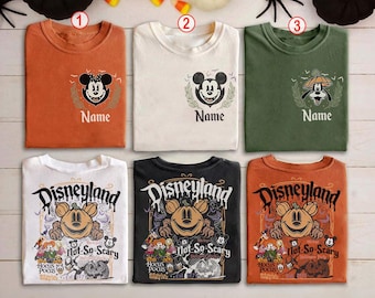カスタムディズニーランドハロウィンシャツ、ヴィンテージミッキーと仲間たちのハロウィンシャツ、WDWディズニーハロウィンパーティー2025シャツ、ミッキーのあまり怖くないTシャツ