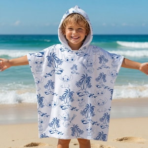 May include: A white hooded poncho towel featuring a repeating blue line art pattern of the character Stitch from Lilo & Stitch, interspersed with illustrations of tropical palm trees and island landscapes across the entire fabric surface.