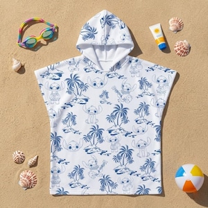 May include: A white hooded poncho towel featuring a repeating blue line art pattern of the character Stitch from Lilo & Stitch, interspersed with palm trees and tropical island motifs. The garment has short sleeves and a hood.