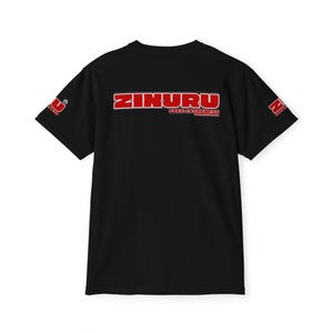 May include: Black t-shirt with a red graphic print that says "ZINURU FREE SMALLNESS" on the back.