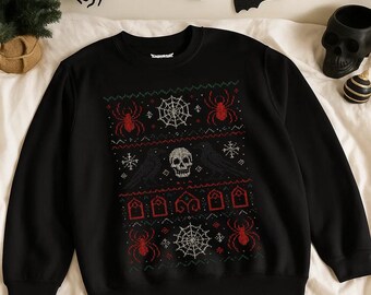 Könnte beinhalten: Schwarzes Sweatshirt mit Rundhalsausschnitt und Halloween-Motiv. Das Design zeigt rote Spinnen, Spinnweben, Raben, einen Totenkopf und Grabsteine. Das Design ist im Strickstil mit roten, weißen und grünen Akzenten gehalten.