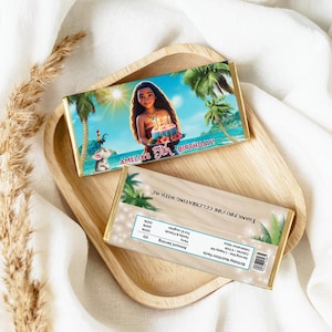 Chocolate bar wrappers covering small candy bars with tropical beach graphics and birthday text.